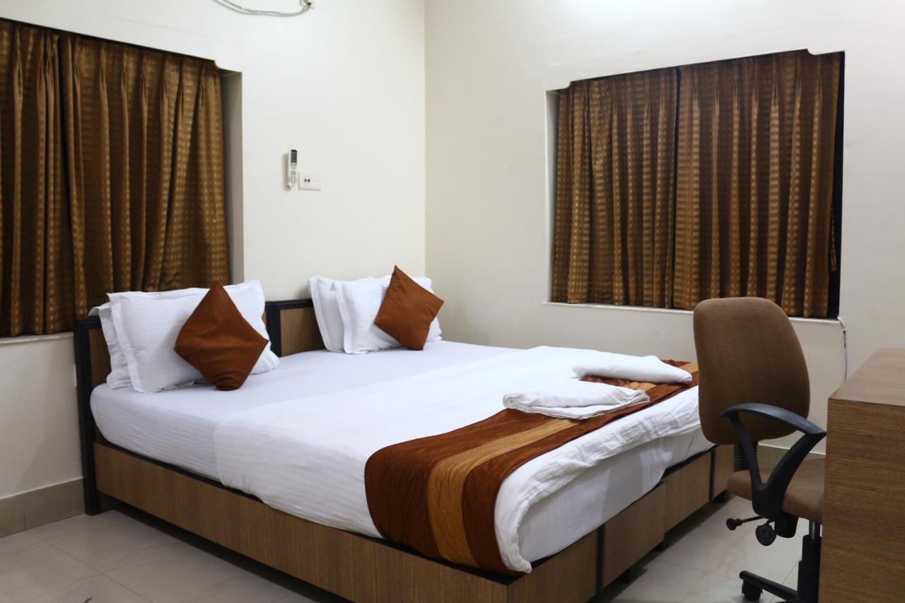 Hotel Crossroads à Calcutta Extérieur photo